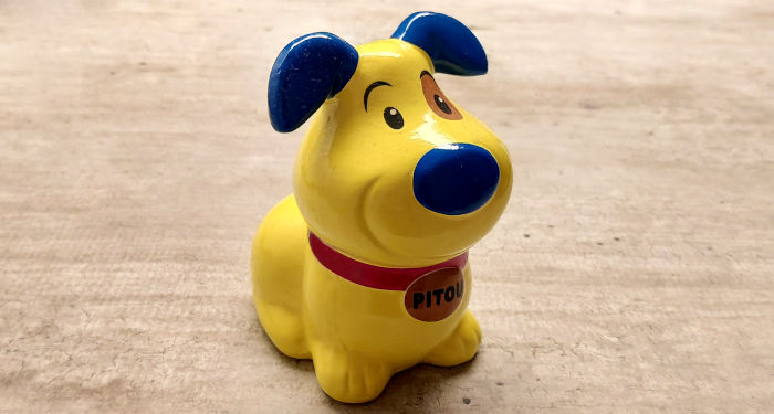 Geltona keramikinė šuniuko figūrėlė